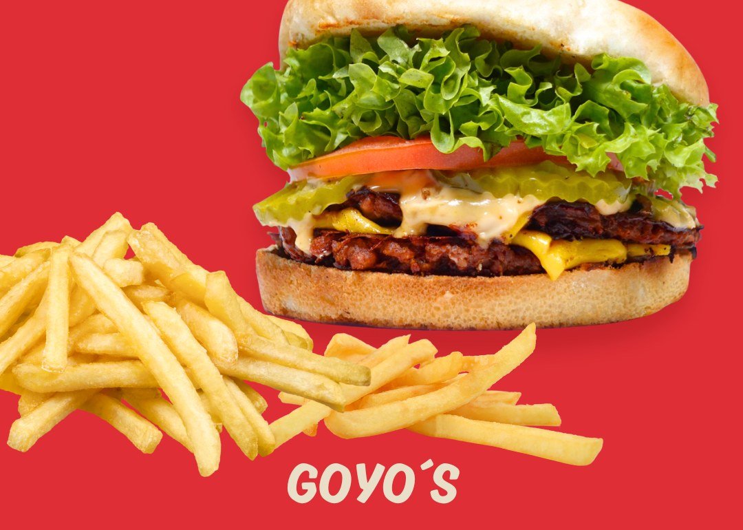 A Goy's plant-based burger with lettuce, tomato, pickles and cheese, with fries